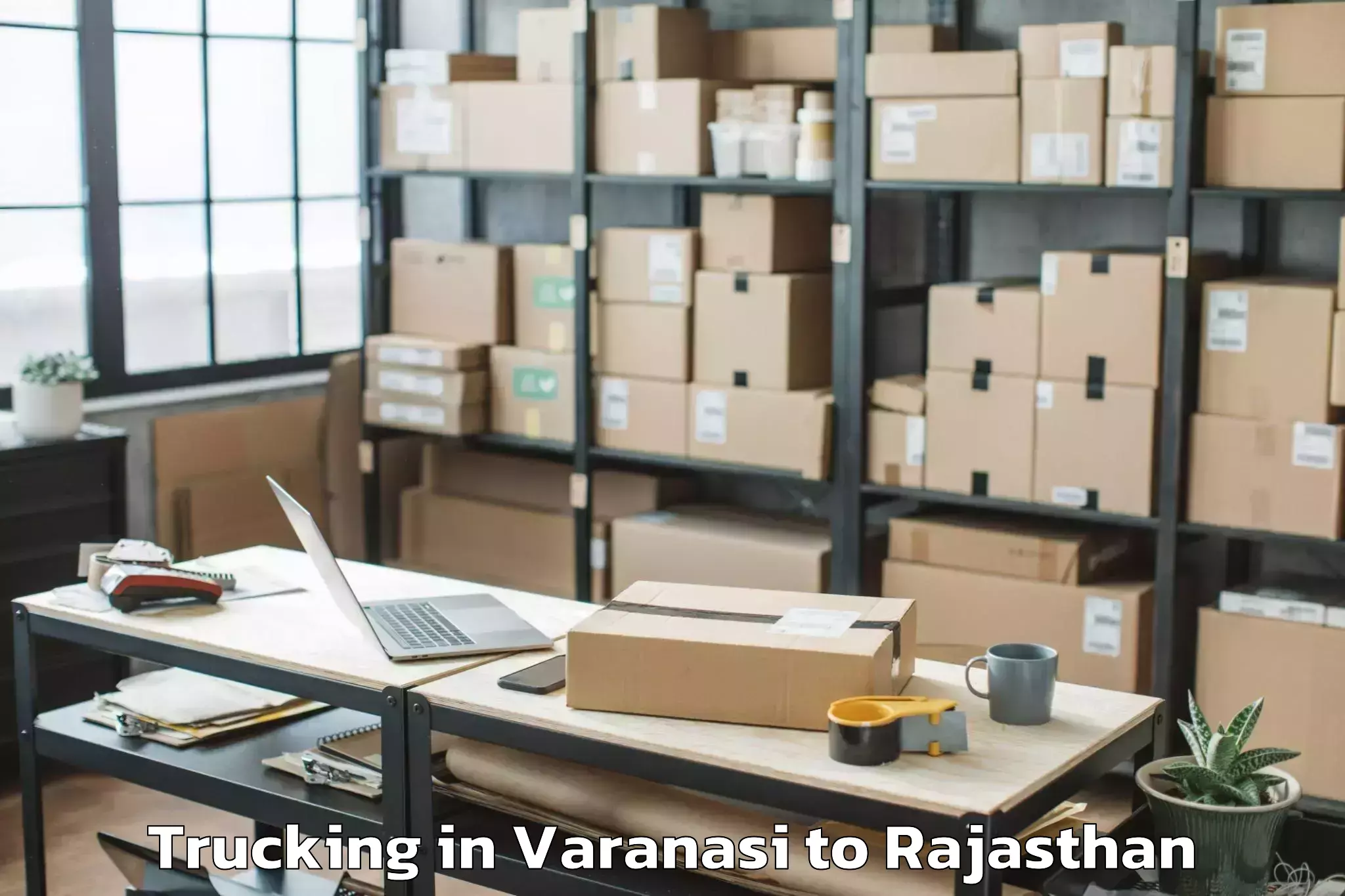 Book Varanasi to Raffles University Neemrana Trucking Online